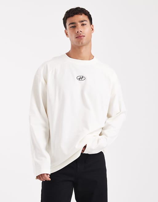 DESIGN heavyweight oversized long sleeve t-shirt with printed chest badge and cut a sew detail in cream