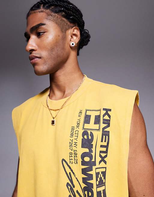 DESIGN Heavyweight Oversized Tank With Text Graphic In Washed Yellow