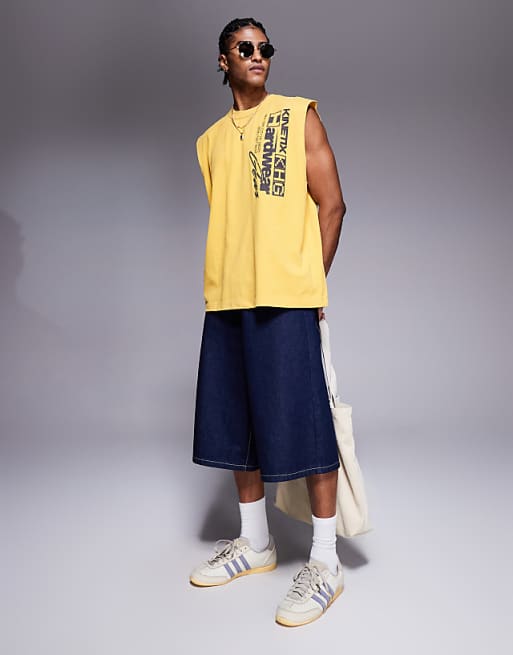 DESIGN Heavyweight Oversized Tank With Text Graphic In Washed Yellow