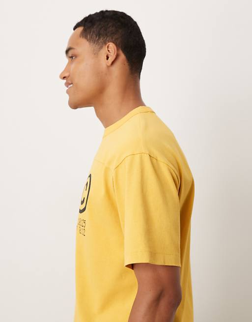 DESIGN Heavyweight Relaxed T-shirt With NYC Graphic In Washed Yellow