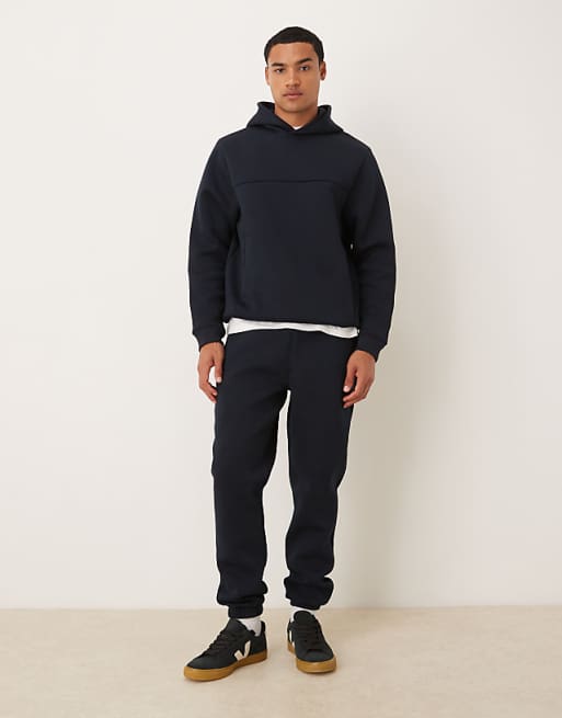 DESIGN heavyweight skinny jogger in scuba-style fabric in navy