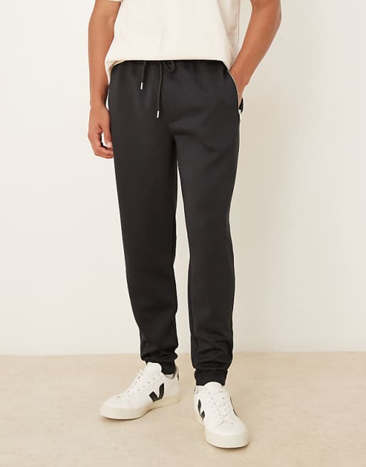 DESIGN heavyweight slim jogger in scuba-style fabric with zipped pockets in black
