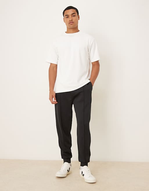DESIGN heavyweight tapered jogger in scuba-style fabric in black