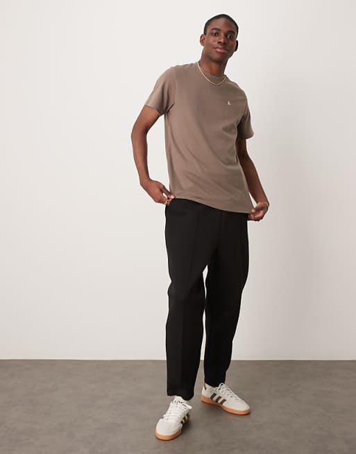 DESIGN heavyweight tapered jogger with pleat detail in scuba-style fabric in black