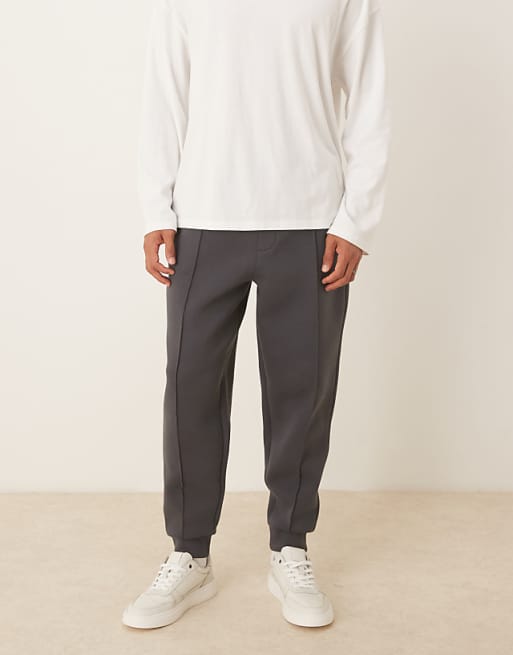 DESIGN heavyweight tapered joggers in scuba-style fabric with pin tucks in charcoal