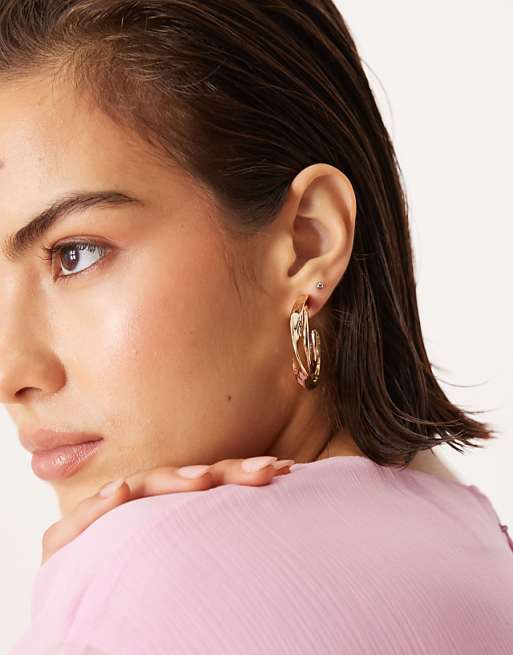 DESIGN hoop earrings with double twisted row design in gold tone