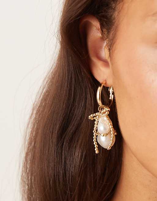 DESIGN hoop earrings with gold tone tassels and faux pearl drops