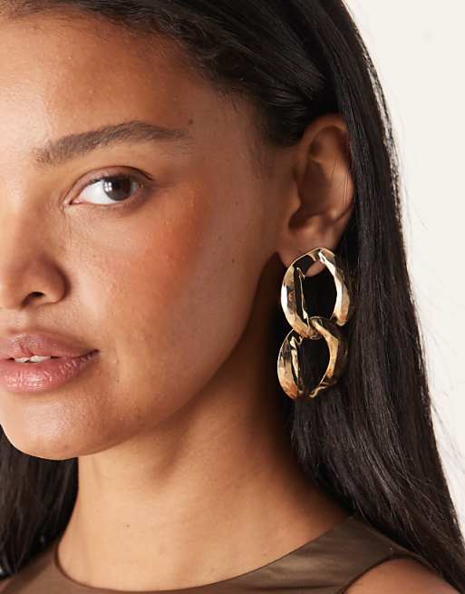 DESIGN large asymmetric stud earrings in gold tone