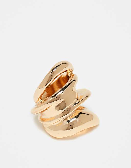 DESIGN large ring with abstract design in gold tone