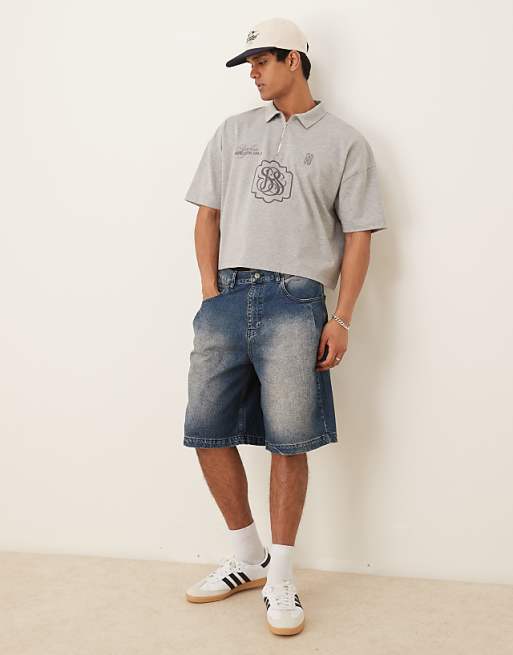 DESIGN long length denim jorts with pleat pocket in mid wash blue