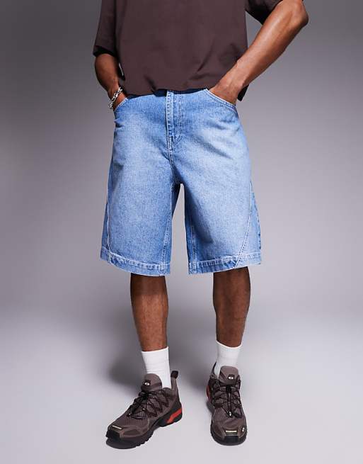 DESIGN long length denim jorts with twisted seam in light wash blue