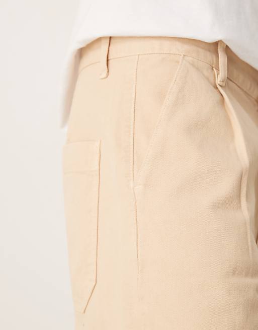 DESIGN Long Length Pleated Shorts In Beige