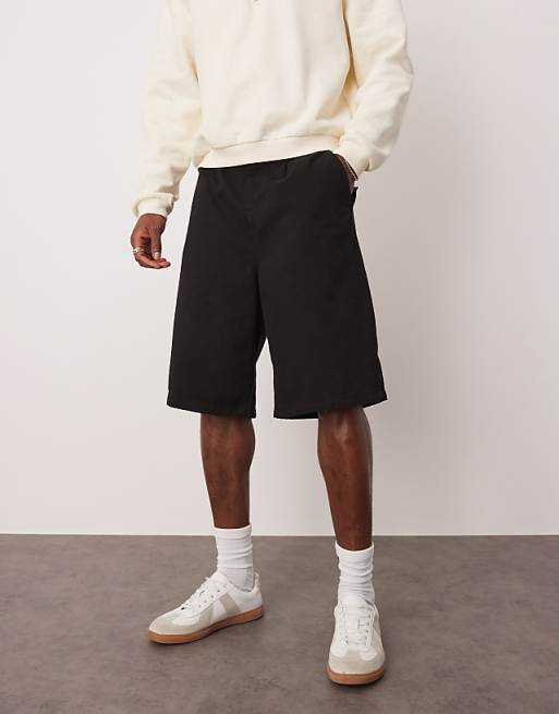 DESIGN long length pleated shorts in black