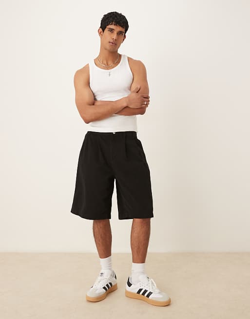 DESIGN long length shorts in black with double pleats