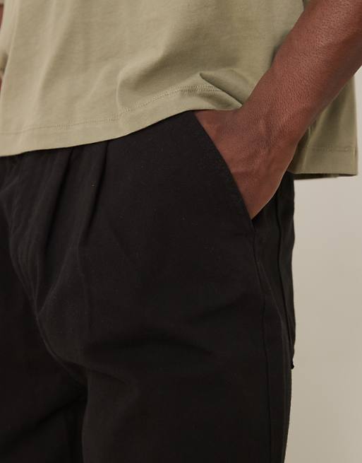 DESIGN Long Length Shorts With Double Pleats In Black