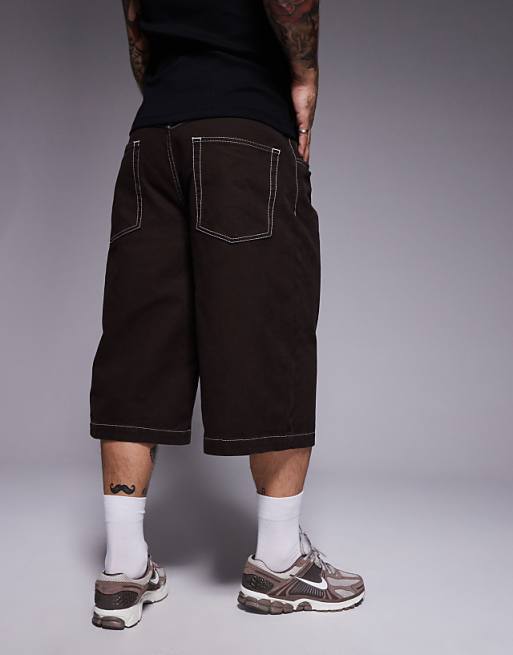 DESIGN Longer Length Contrast Stitch Shorts In Brown With Pleats