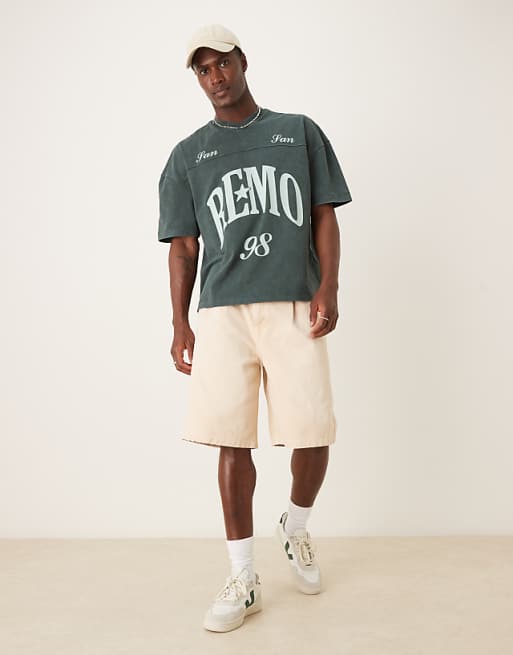 DESIGN longer length pleated denim jort in orange tint