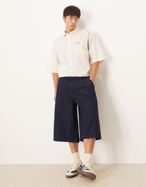 DESIGN longer length pleated denim jort in raw wash