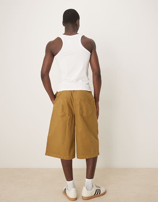 DESIGN Longer Length Shorts With Belt And Pleats In Olive Green