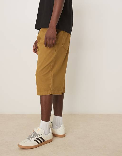 DESIGN Longer Length Shorts With Belt And Pleats In Olive Green