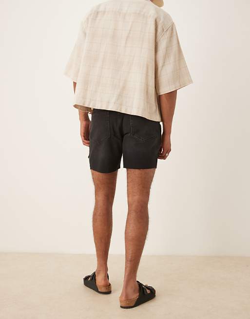 DESIGN Mid Length Slim Denim Shorts With Rips In Black