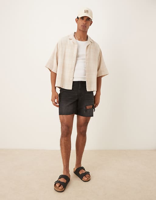 DESIGN mid length slim denim shorts with rips in black