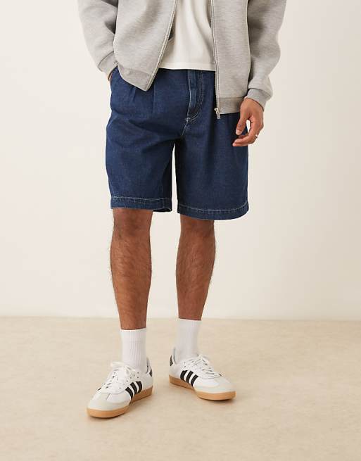 DESIGN mid length wide denim shorts with pleat in dark wash blue