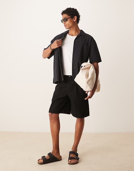 DESIGN mid length wide denim shorts with tie front in black wash