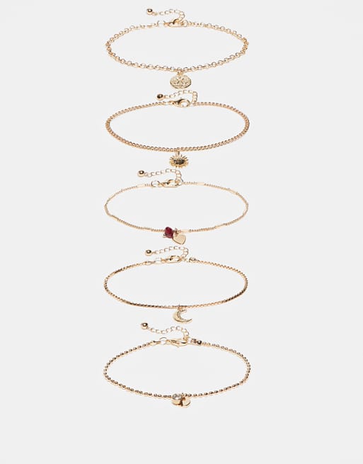 DESIGN multi-pack bracelets with fine chains and charm drop details in gold tone
