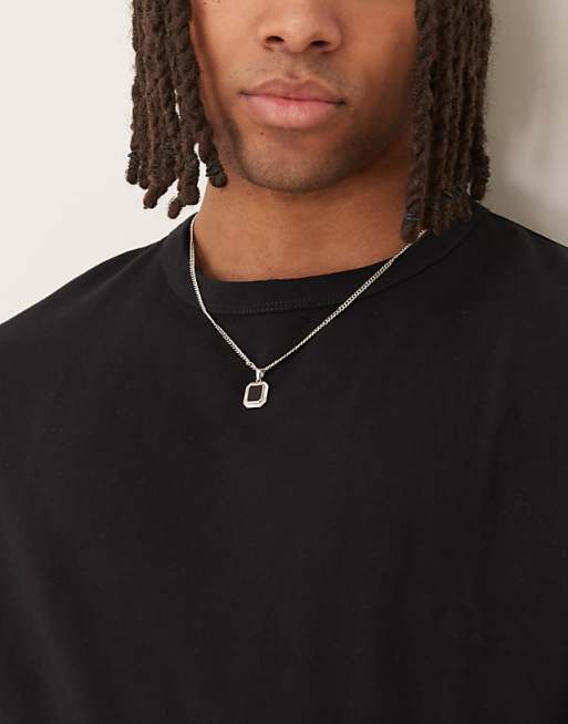DESIGN necklace with square black stone pendant in silver tone