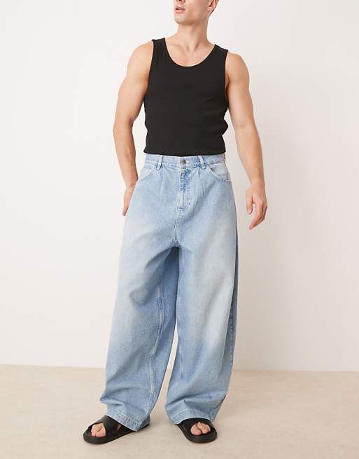 DESIGN oversized baggy pleated jeans in light wash blue