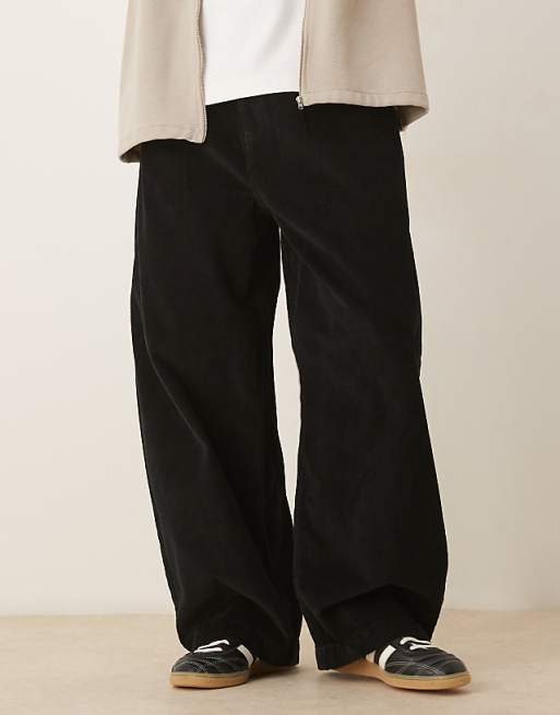 DESIGN oversized baggy trousers in black corduroy