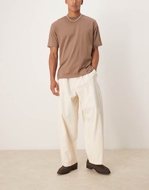 DESIGN oversized baggy trousers in cream with pleats