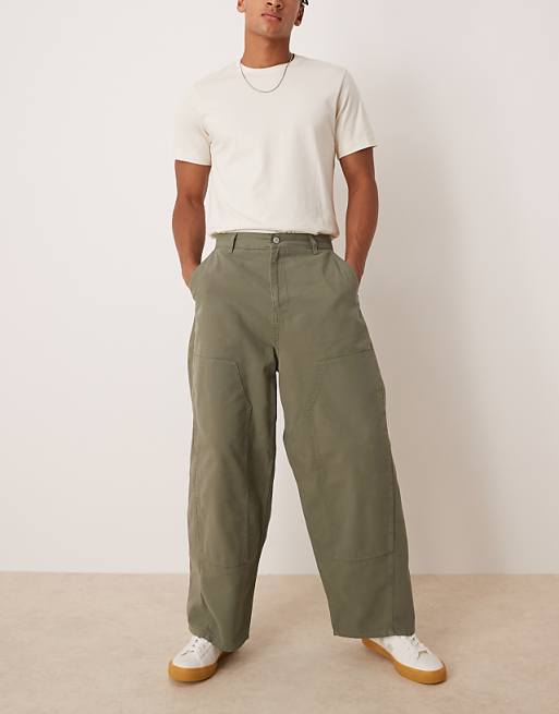 DESIGN oversized baggy trousers in khaki with carpenter details