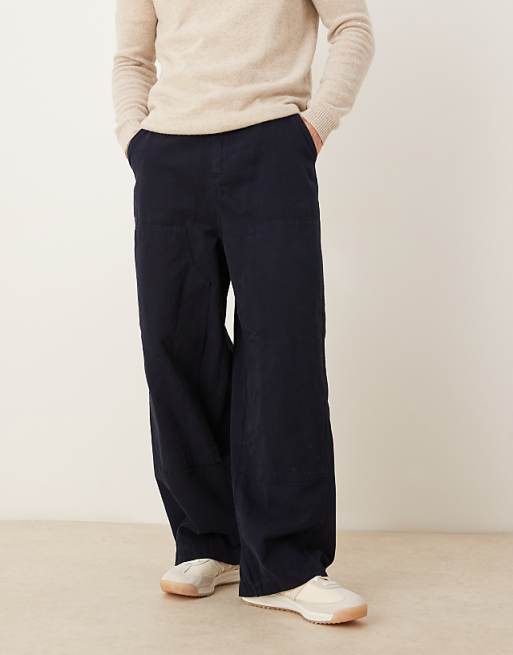 DESIGN oversized baggy trousers in navy with carpenter details