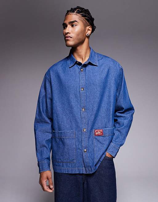 DESIGN oversized denim look shirt with badge detail in blue