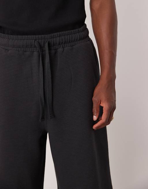 DESIGN Oversized Longer Length Textured Shorts In Navy