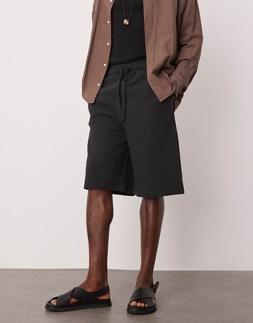 DESIGN oversized longer length textured shorts in navy