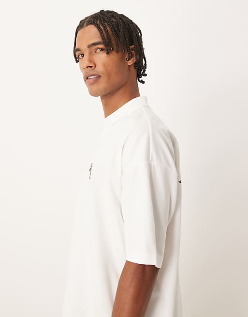DESIGN Oversized Polo With Back And Front Crest Print In Cream