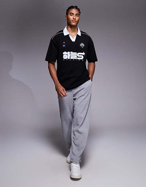 DESIGN Oversized Polo With Piping Detail And Sports Graphic In Black