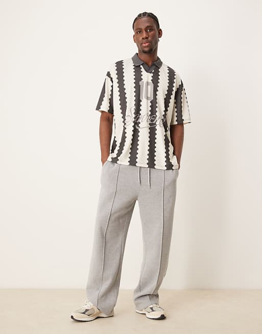 DESIGN Oversized Polo With Sports Graphic And All Over Print