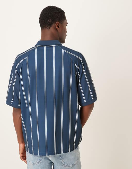 DESIGN Oversized Polo With Sports Graphic In Navy Striped Sports Fabric