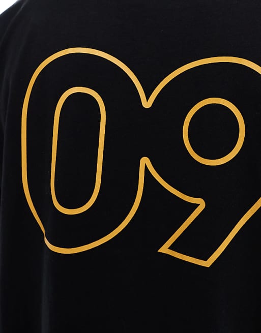 DESIGN Oversized T-shirt With Sports Graphic In Black