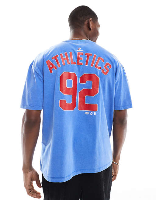 DESIGN oversized t-shirt with sports graphic in washed blue