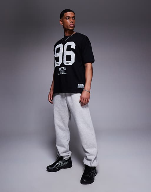 DESIGN Oversized T-shirt With Sports Graphics In Black