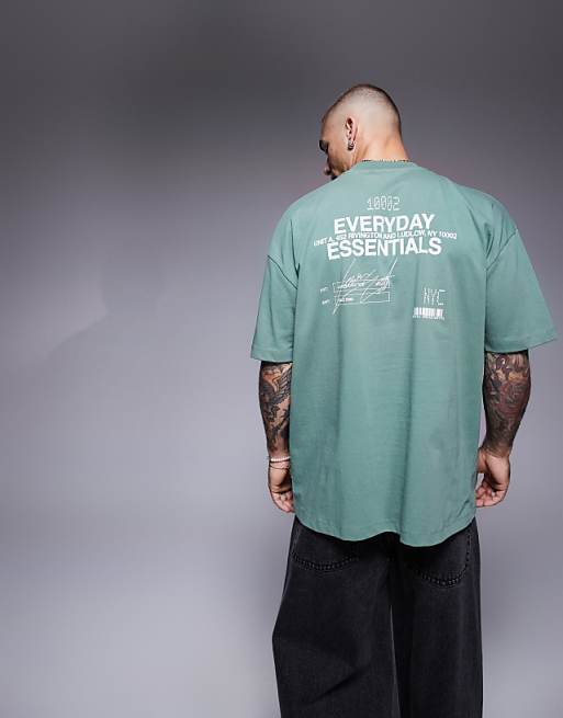 DESIGN oversized t-shirt with text graphic in green