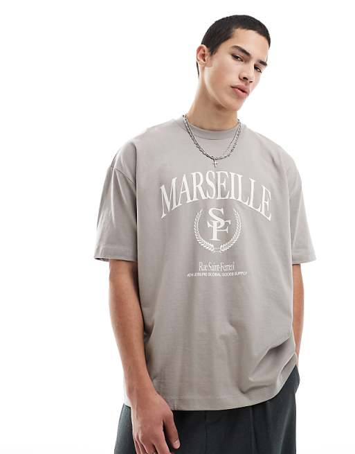 DESIGN oversized t-shirt with varsity graphics in brown