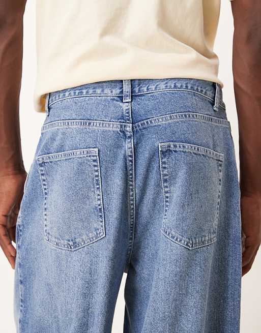 DESIGN Oversized Tapered Jeans In Light Wash Blue With Pleats