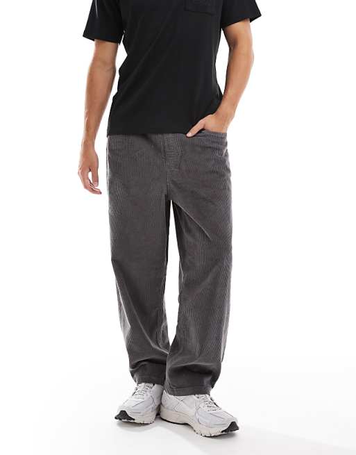 DESIGN oversized tapered pull on trousers in charcoal corduroy