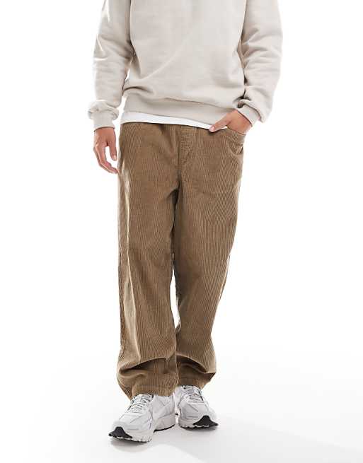 DESIGN oversized tapered pull on trousers in beige corduroy